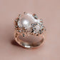 Tides of Tethys talisman ring
handcrafted astrological talisman Tides of Tethys