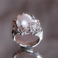 Tides of Tethys talisman ring
handcrafted astrological talisman Tides of Tethys