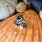 Coral Venus Star Ring with Sapphire and Chrysolite